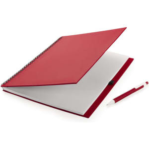 A red notebook with a spiral binding and a white interior, accompanied by a matching red pen.
