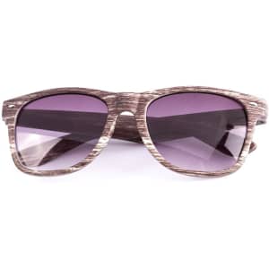 A pair of sunglasses with a wooden frame and tinted purple lenses, featuring a logo on the side.