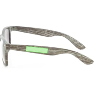 A pair of grey striped sunglasses with a green accent, featuring a logo on the side.