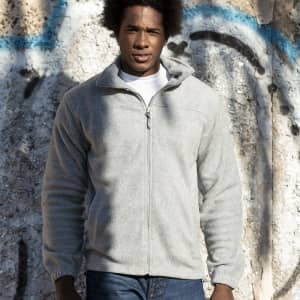 A grey polar fleece jacket with a zip and stand collar, featuring a logo on the chest.