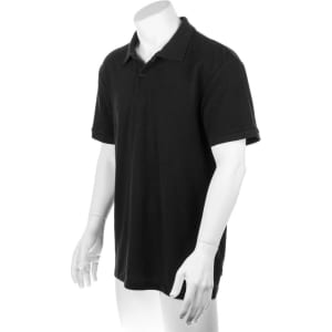 A black polo shirt displayed on a mannequin, featuring a collar and short sleeves, with a logo on the sleeve.