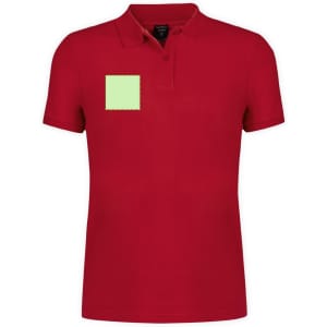 A red polo shirt with a green patch on the front and a collar. The shirt features a logo.