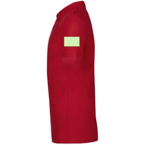 A red polo shirt with a blank patch on the sleeve, featuring a classic collar and short sleeves.