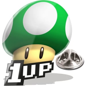 A green and white mushroom with a smiling face, accompanied by a silver pinback.