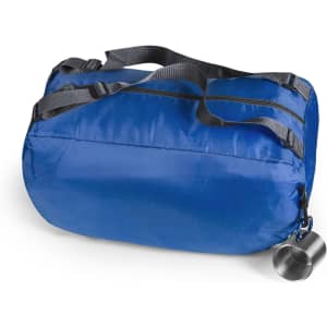 A blue backpack bag with grey straps, featuring a zip closure and a small clip for accessories.