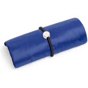 A blue foldable bag secured with a black band, featuring a metallic button. It has a sleek, compact design.