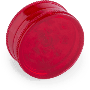 A red grinder with a textured edge, featuring a circular design and a clear top.
