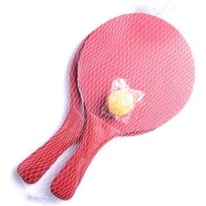 Red beach rackets in a netting bag with a yellow ball. Suitable for leisure activities outdoors.