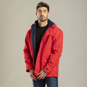 A red puffer jacket with a navy interior, featuring a hood and pockets, worn by a model against a neutral background.