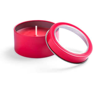 A red scented candle in a round tin with a clear lid. The lid is slightly open, revealing the candle inside.