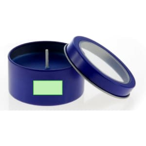A blue aromatic candle in a round tin with a clear lid. The candle is unlit and features a wick.