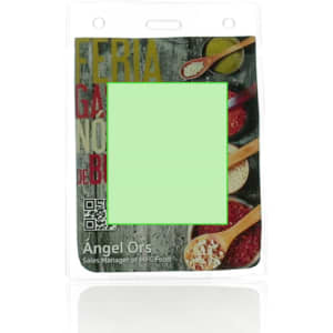 A transparent name badge featuring a colourful background with spices and a placeholder for a name.