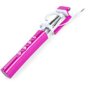 A pink selfie stick with a silver extendable arm and a white audio connector, featuring buttons on the handle.
