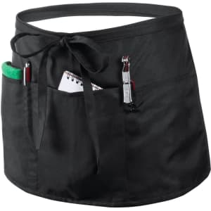 A black apron with pockets, featuring a notepad, pen, and a green cloth attached. It has a tie closure and a logo.