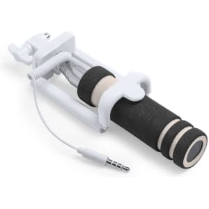A black and white selfie stick with a phone holder and a headphone jack connector. It features a rubber grip handle.