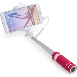 A red selfie stick with a grey extension arm holding a smartphone, featuring a grip handle.