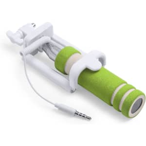 A green and white selfie stick with a foam grip and a headphone jack for connecting to phones.