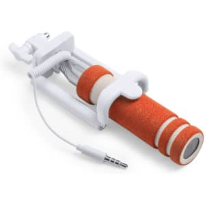 An orange and white selfie stick with a cable for connection, featuring a foam grip. It has a logo on the handle.