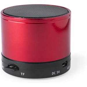A red cylindrical speaker with a black top and connection options at the base, featuring a logo.