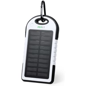 A rectangular white and black power bank with a solar panel and a carabiner attached. It features a logo.