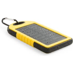 A power bank in black and yellow with a textured surface and a carabiner attached for easy carrying.