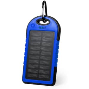 A blue and black power bank with a solar panel and a carabiner for attaching. It features a logo.