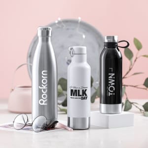 A drink bottle trio featuring a silver stainless steel bottle, a white insulated bottle, and a black thermos, all with logos.