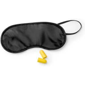 A black sleep mask with two yellow earplugs, featuring a soft finish and adjustable strap.