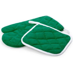 A green quilted oven mitt set including two mitts and a pot holder, featuring white trim. It has a branding logo.