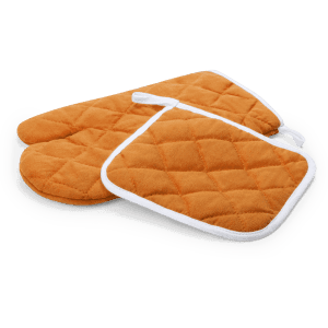An orange quilted oven mitt set, including two mitts and a pot holder, with white trim. Features a logo.