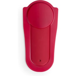 A red phone stand with a circular top and a flat base. Features a logo on the surface.