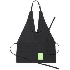 A black apron with a buttoned front, adjustable neck strap, and a small green patch on the front.
