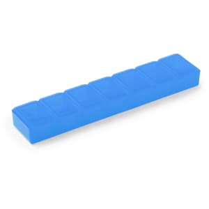 A blue pillbox with eight compartments, featuring a smooth surface and a small logo.