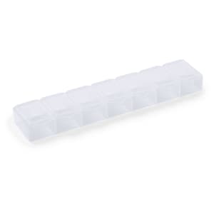 A clear plastic pillbox with multiple compartments for organising medications. It has a sleek, streamlined design.