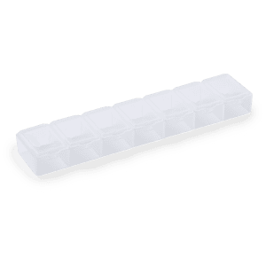 A clear plastic pillbox with eight compartments for organising medications, featuring a simple design.