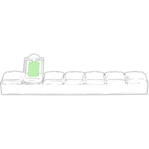 A green pillbox with compartments for medication, featuring a holder section at one end.
