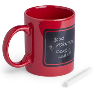 A red coffee mug with a chalkboard surface and a piece of chalk beside it. It features a logo.