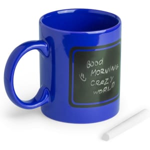 A blue coffee mug with a chalkboard finish and a piece of chalk beside it, featuring a logo.