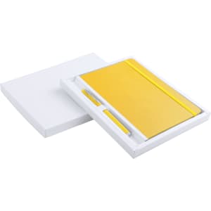A yellow notebook and pen set in a white gift box, featuring a logo on the notebook.