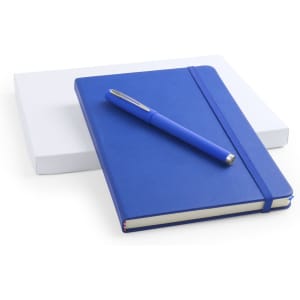 A blue notebook with an elastic closure, accompanied by a matching blue pen, on a white background.