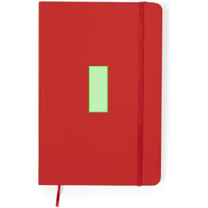 A red notebook featuring a green rectangle design and an elastic closure. It has a matching red ribbon bookmark.