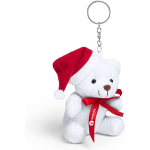 A white teddy bear keyring wearing a red Santa hat and bow, attached to a silver keychain.