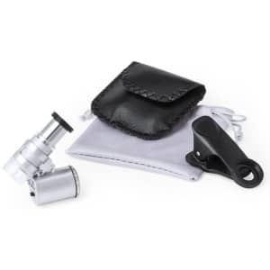 A silver microscope with a clip, a black pouch, and a grey drawstring bag. The items are arranged neatly.