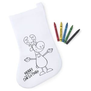 A white Christmas stocking featuring a cartoon reindeer design, accompanied by five multi-coloured crayons.