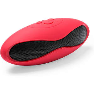 A red portable speaker with a smooth design and mesh speaker grill, featuring control buttons on top.