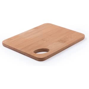 A bamboo cutting board with a rounded handle cutout, featuring a smooth, natural finish.