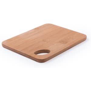 A bamboo cutting board with a rounded handle cut-out, featuring a smooth, natural finish.