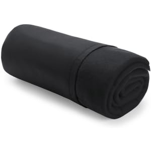 A rolled black blanket made of soft material, featuring a smooth finish and a simple design.