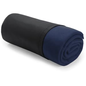 A rolled blanket in navy blue with a black outer sleeve, featuring a logo.