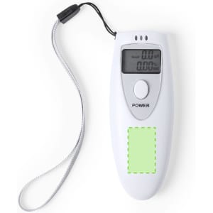A white alcohol tester device with a digital display and a strap, featuring a green area on its front.